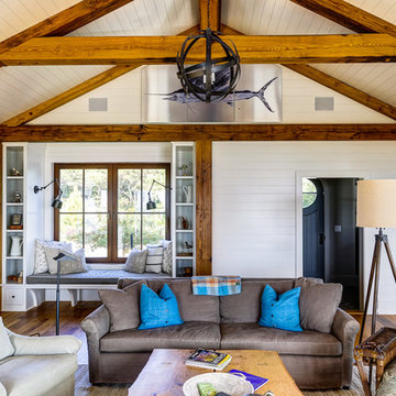 Casual beach living room with exposed wood barn beams