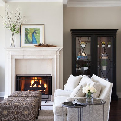 Large elegant formal and open concept dark wood floor and brown floor living room photo in Austin with beige walls, a standard fireplace, a stone fireplace and no tv