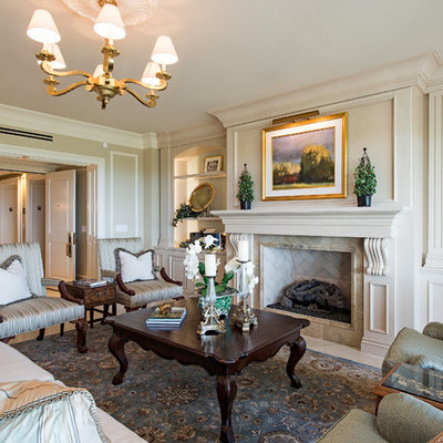 Example of a classic formal beige floor living room design in Other with beige walls, a standard fireplace, a stone fireplace and no tv