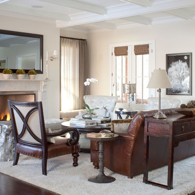 Inspiration for a timeless living room remodel in Denver with beige walls and a standard fireplace