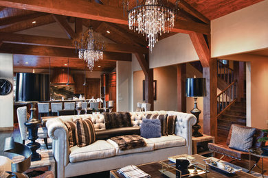 Living room - large rustic open concept dark wood floor living room idea in Los Angeles with beige walls