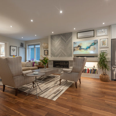 Mid-sized transitional formal and open concept dark wood floor and brown floor living room photo in Toronto with gray walls, a standard fireplace, a tile fireplace and no tv