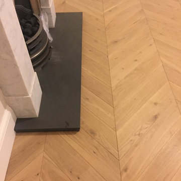 Chevron parquet supply and installation. Luxury residential apprtments.