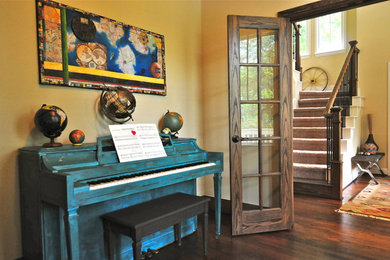 Inspiration for an eclectic enclosed living room remodel in Dallas with a music area and yellow walls
