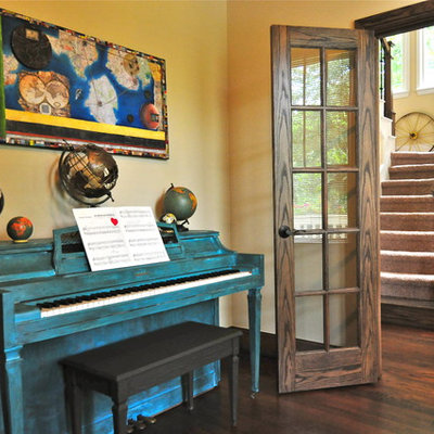Inspiration for an eclectic enclosed living room remodel in Dallas with a music area and yellow walls