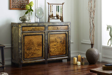 Inspiration for a world-inspired living room in Other with dark hardwood flooring.