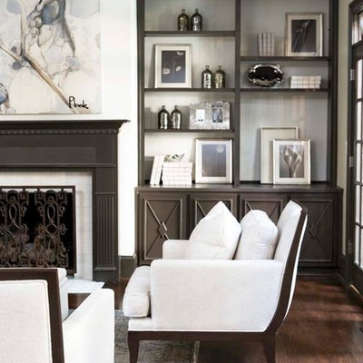 Inspiration for a large timeless enclosed dark wood floor living room remodel in Other with white walls, a standard fireplace, no tv and a tile fireplace