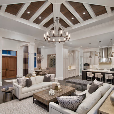 Inspiration for a transitional open concept dark wood floor living room remodel in Miami with white walls
