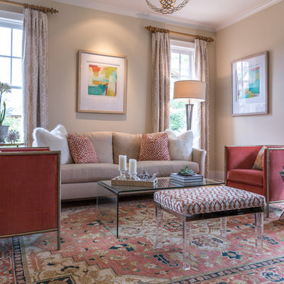 Inspiration for a mid-sized transitional formal and enclosed medium tone wood floor and brown floor living room remodel in Denver with beige walls, no fireplace and no tv