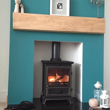Classy Laura Ashely Stove.
Installed into a Modern fire boarded fireplace openin