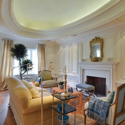 Inspiration for a mid-sized victorian formal and enclosed medium tone wood floor and brown floor living room remodel in Dallas with white walls, a standard fireplace and a tile fireplace