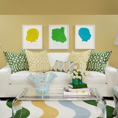 Inspiration for a large timeless open concept medium tone wood floor living room remodel in Little Rock with yellow walls