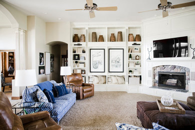 Inspiration for a large living room remodel in Other with a corner fireplace, a stone fireplace and a wall-mounted tv