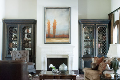 Large mediterranean living room in Houston with a stone fireplace surround.
