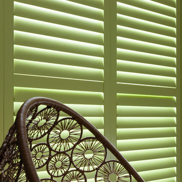 Closed Lime Green Window Shutters