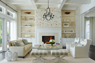 This is an example of a nautical formal open plan living room in Miami with beige walls, dark hardwood flooring and a standard fireplace.