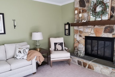 Small country enclosed carpeted and gray floor living room photo in Philadelphia with green walls, a standard fireplace, a stone fireplace and a tv stand