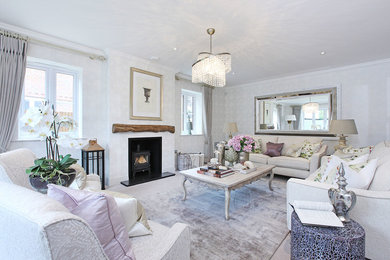 Design ideas for a classic living room in Surrey with grey walls and a wood burning stove.
