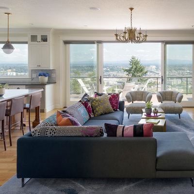Example of a large transitional open concept and formal light wood floor and brown floor living room design in Portland with beige walls, a standard fireplace, a stone fireplace and no tv