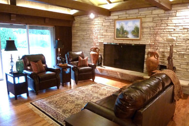 Inspiration for a rustic living room remodel in Wichita