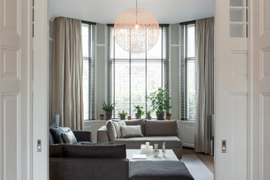 Trendy living room photo in Amsterdam