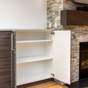 Complete home remodel with custom IKEA storage and relocation of fireplace