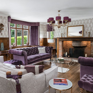 Inspiration for a large classic formal living room in Surrey with multi-coloured walls, dark hardwood flooring, a standard fireplace, a brick fireplace surround, no tv and brown floors.