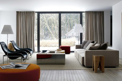 This is an example of a contemporary living room in Cheshire.