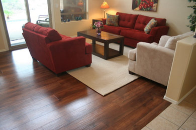 Mid-sized transitional dark wood floor living room photo in Phoenix with beige walls