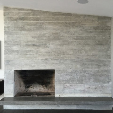 Concrete board form veneer tile fireplace floating concrete hearth
