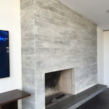 Concrete board form veneer tile fireplace/ floating concrete hearth