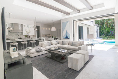 Inspiration for a large contemporary open concept porcelain tile and gray floor living room remodel in Miami with white walls, no fireplace and no tv