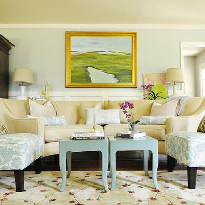 Example of a classic living room design in Charleston with blue walls
