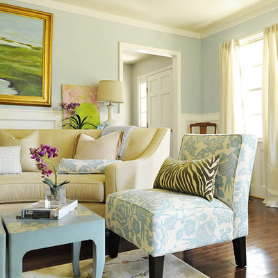 Elegant living room photo in Charleston with blue walls