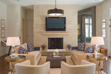 This is an example of a large modern open plan living room in Austin with white walls, dark hardwood flooring, a standard fireplace, a stone fireplace surround and a wall mounted tv.