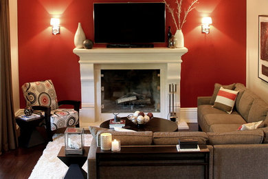 Example of a large trendy open concept dark wood floor living room design in Chicago with gray walls, a standard fireplace, a concrete fireplace and a wall-mounted tv