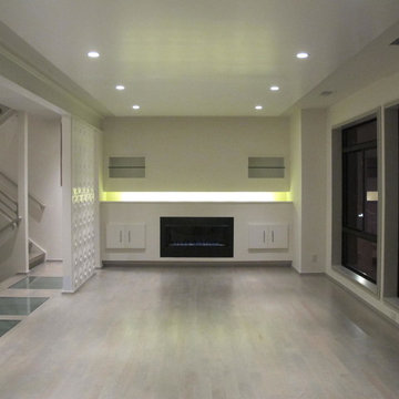 Contemporary living room and glass floor bridge in Kansas City new custom home