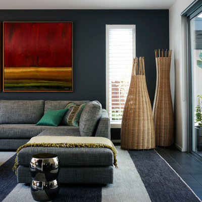 Trendy living room photo in Melbourne with gray walls