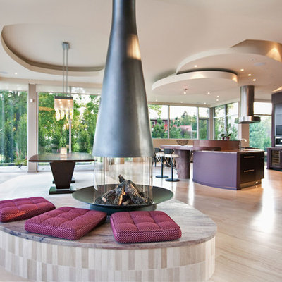 Living room - contemporary open concept light wood floor living room idea in Toronto with purple walls and a two-sided fireplace