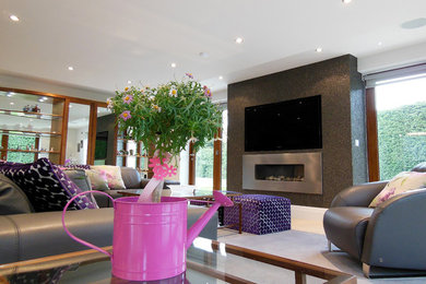Example of a trendy living room design in Kent