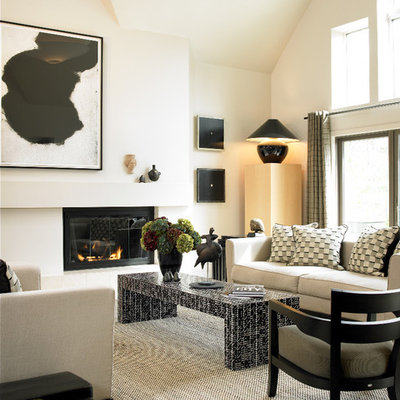 Inspiration for a mid-sized contemporary formal and open concept dark wood floor living room remodel in Boston with white walls, a standard fireplace, a plaster fireplace and no tv
