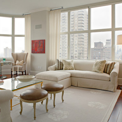 Example of a large trendy living room design in New York with gray walls