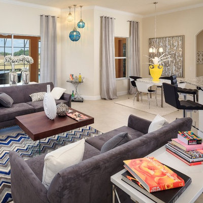 Trendy open concept living room photo in Orlando with beige walls