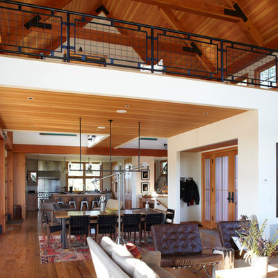 Inspiration for a cottage open concept living room remodel in Milwaukee with white walls