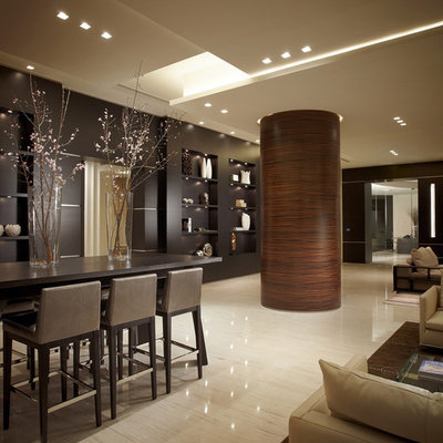 Example of a trendy open concept living room design in Miami with black walls