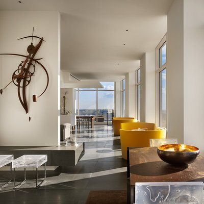 Inspiration for a contemporary open concept living room remodel in Philadelphia with white walls