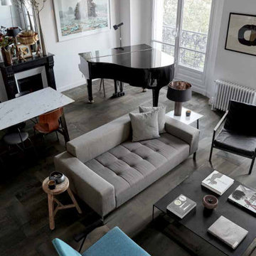 Contemporary living room with rustic dark grey porcelain tile