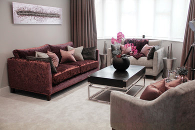 Design ideas for a medium sized contemporary formal open plan living room in London with grey walls, carpet, a standard fireplace, a tiled fireplace surround, no tv and beige floors.