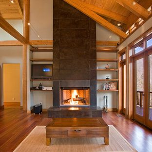 Living room - large craftsman open concept medium tone wood floor living room idea in Other with white walls, a standard fireplace, a stone fireplace and a media wall