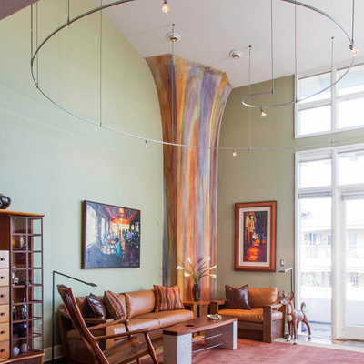 Eclectic formal living room photo in San Diego with green walls